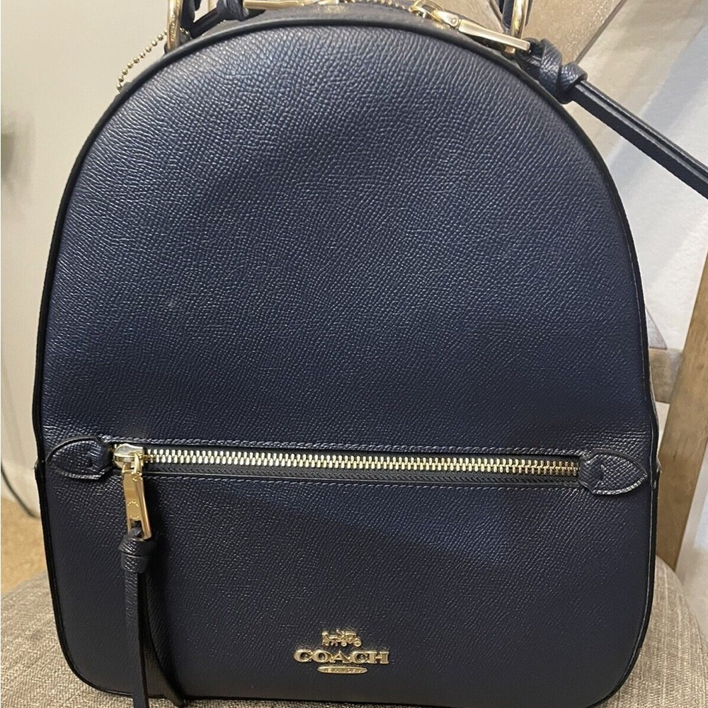 Dark blue COACH backpack for sale.